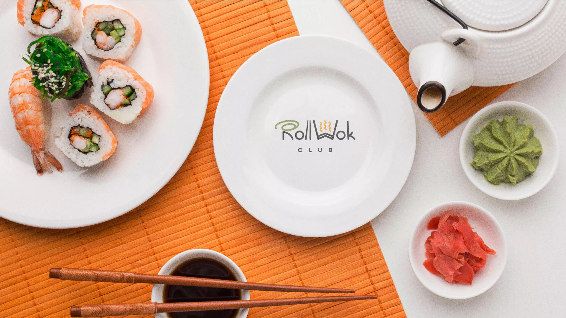 Разработка логотипа и фирменного стиля суши-бара «Roll Wok Club» в Нюрбе