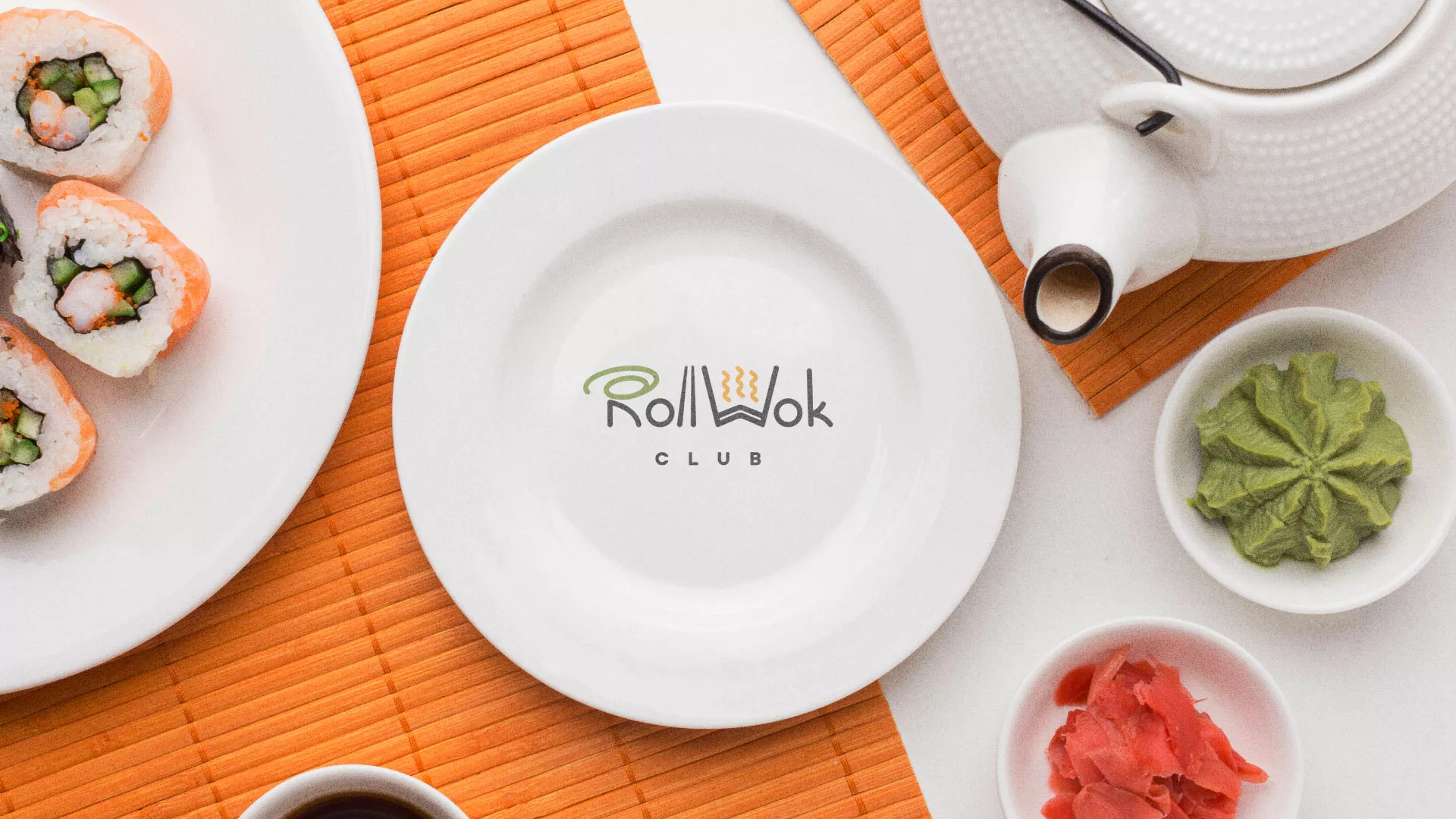 Разработка логотипа и фирменного стиля в Нюрбе для суши-бара «Roll Wok Club» Разработка логотипа и фирменного стиля в Нюрбе для суши-бара «Roll Wok Club»